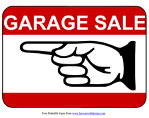 pointing left garage sale street sign