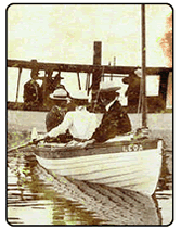 vintage greetings card couple in boat